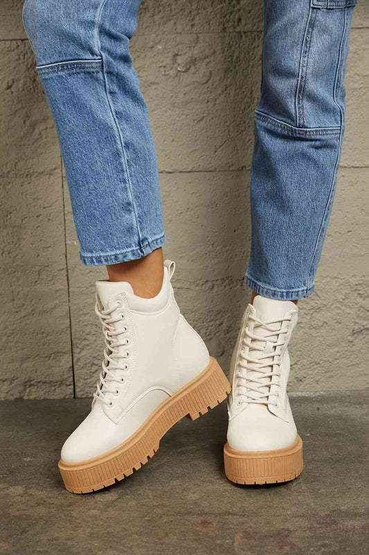 The Tallulah: Ivory Platform Combat Boots by East Lion Corp