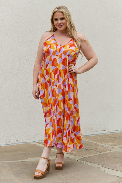 Vibrant Dreams: Multicolored Printed Sleeveless Maxi Dress