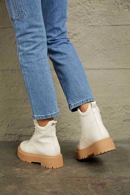 The Tallulah: Ivory Platform Combat Boots by East Lion Corp