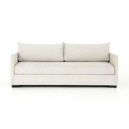 A contemporary sofa bed featuring knife-edge cushions and high-end fabric for ultimate comfort and style. The queen-size bed hidden within makes it effortless to accommodate overnight guests or enjoy cozy movie nights. Durable performance fabric ensures resistance to spills, stains, and high traffic, making it a long-lasting choice for busy households. 